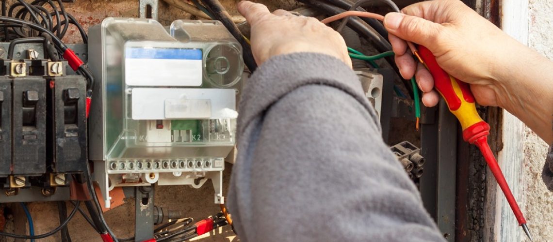 Repair,Of,Old,Electrical,Switchgear.,An,Electrician,Replaces,Old,Electrical